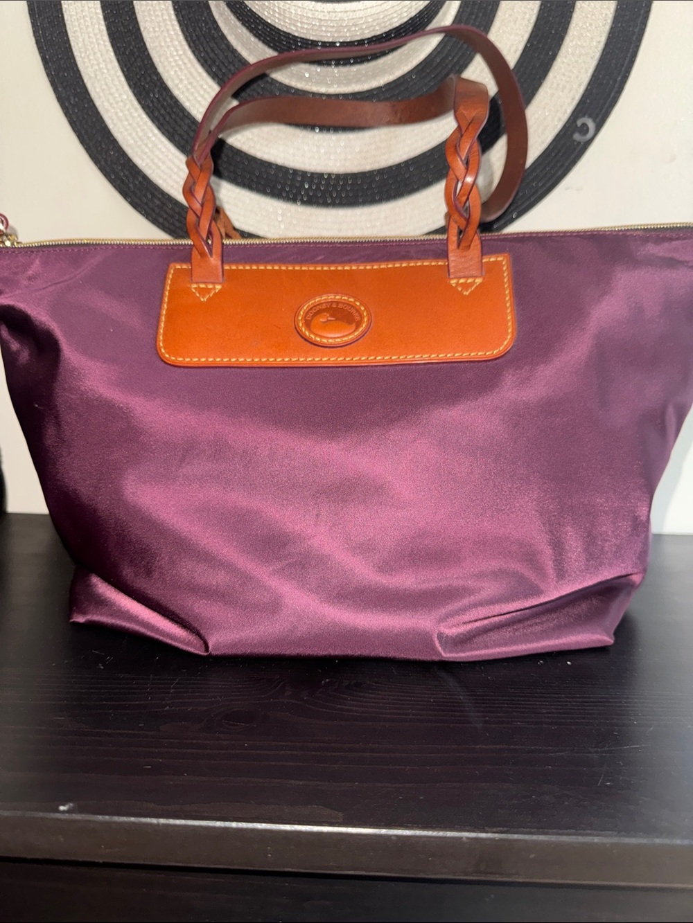 Dooney and Bourke Women's burgundy  Tote Bag with Tan Leather Trim.